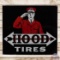 Hood Tires Double Sided Porcelain Sign w/ Flag Man
