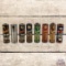 Group of 8 Whiz Gear Bearing Chassis Advertising Metal Cans