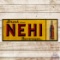 Drink Nehi Beverages Emb. Single Sided Tin Sign w/ Bottle