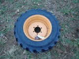 (1) 10-16.5 N.H.S New Skid Steer Tire and Rim