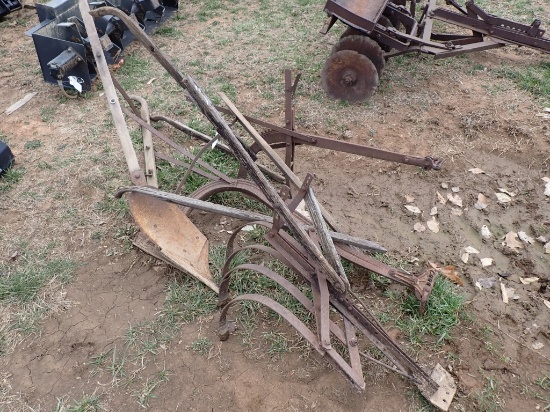Three Antique Plows