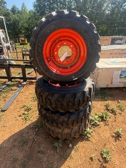 (4) New 10-16.5 NHS Bobcat Tires & Rims