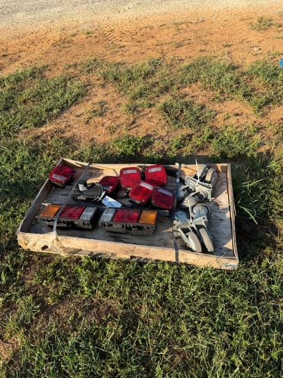Pallet of Trailer Lights and Caster Wheels