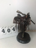 Genuine Bronze Saddle in Marble w/removable Bronze Rifle By Bob Beeler