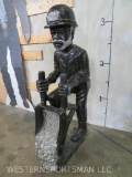 Stone Statue of African Miner