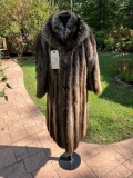 Beautiful Raccoon fur coat, still has a new smell, Sleeve is 23 inches, length 32 inches and shoulde
