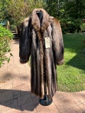 Beautiful Raccoon fur coat, still has a new smell, Sleeve is 26 inches, length 48 inches and shoulde