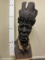 Massive iron wood carving of an African medicine man. Great detail by master carver Charles Moyo of