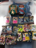 Pokemon- 12 Opened Packs w/cards Inside + 2 Empty Tins...