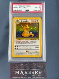 PSA 8 Dragonite Fossil Base set- Holo Pokemon