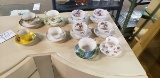 COLLECTABLE TEA CUPS WITH SAUCERS