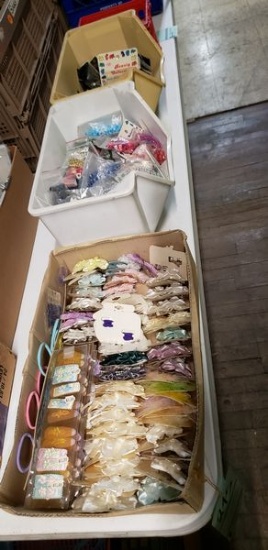 LOT OF HAIR ACCESSORIES IN 4 BINS