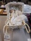 PORCELAIN DOLL IN CARRIAGE