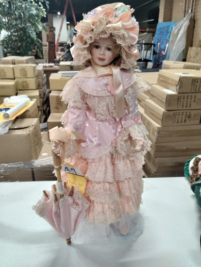 UNMARKED PORCELAIN DOLL WITH STAND 18"
