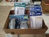 BOX OF NEW CONAIR PHONES