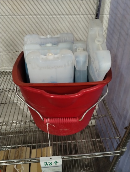 LOT OF ICE PACKS IN A BUCKET