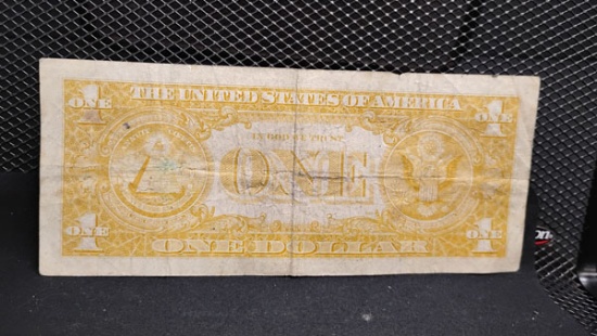 U.S. 1963-A GREEN SEAL $1 BILL - SERIAL # A24386228A - ONE SIDE HAS TURNED YELLOW