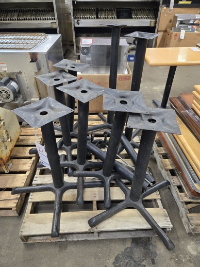 SKID OF CAST IORN PEDESTAL TABLE LEGS
