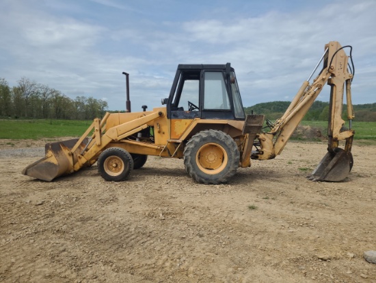 Case model 580C Backhoe with extended boom and extra bucket