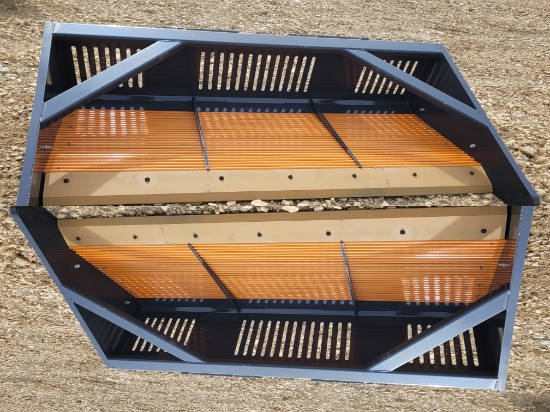 Skid steer rock screening bucket