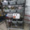 Rack w/Contents:  Dirt Devel Filters, Arbors, Circuit Breakers, Anchor Scre