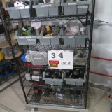 Rack w/Contents:  Dirt Devel Filters, Arbors, Circuit Breakers, Anchor Scre