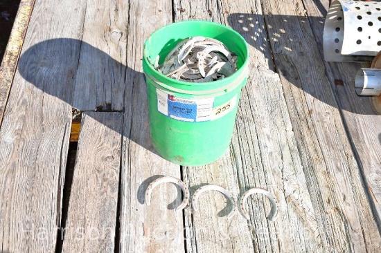 5 gal bucket of horse shoes