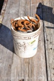 5 gal bucket of horse shoes