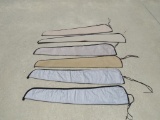 Six soft slip on gun cases.