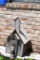 handmade birdhouse with tin roof and vintage glass door knob