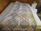 King sized, blue and pink floral quilt. With matching throw pillow.