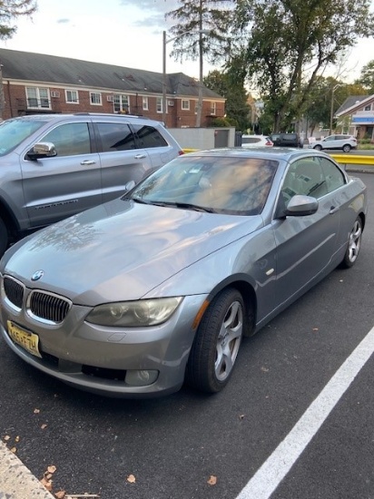 2010 BMW 328i Convertible. 6 cyl, automatic.