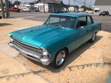 1967 Chevrolet Nova Coupe. New 350 motor and trans. Restored six years ago.