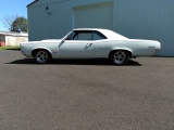 1966 Pontiac GTO 2 Door Hardtop. Real â€œ242â€ Car. White with black bucke