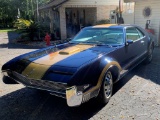 1966 Oldsmobile Toronado Coupe. Older restoration done to the theme of a Hu