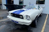 1976 Ford Mustang Cobra II Coupe. 302 L 4-speed white with blue stripe comb