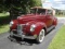 1940 Ford Deluxe Convertible. Quality restored in Mandarin Maroon with tan