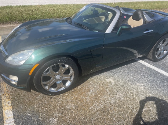 2007 Saturn Sky Convertible. Carfax 1 owner. Automatic. Tan leather. Custom