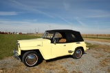 1949 Willys Jeepster finished in a yellow paint covering a beautifully refi