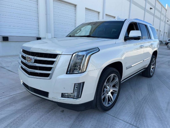 2015 Cadillac Escalade SUV. Fully loaded. Saddle interior. Rear bucket seat