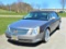Uniquely customized 2007 Cadillac DTS D'Elegance in Gold Mist and Brown met