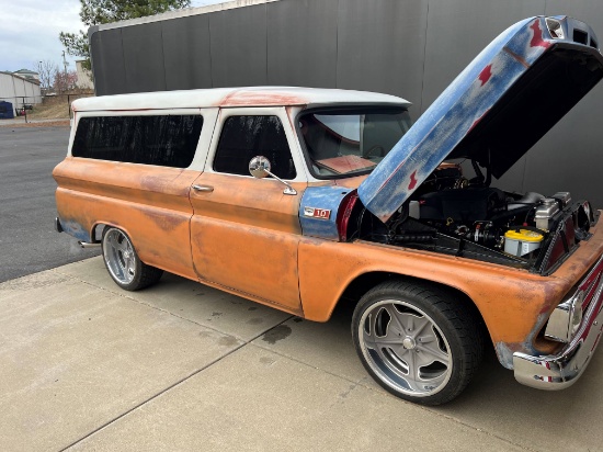 1965 Chevrolet Suburban Carryall SUV. Panel-type rear doors. 3 row seating.
