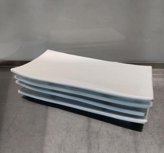 White rectangular plastic trays