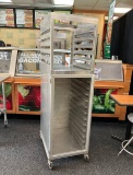 Aluminum bread rack and storage rack on casters.