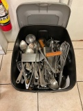 Container with kitchen utensils