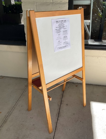 A Sign. Chalk board and White Board