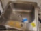 3 stainless steel sinks with a faucet