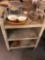 Rubbermaid three shelf kitchen cart with miscellaneous pan and bowls