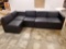 Appears to be a genuine leather couch sofa,not certain