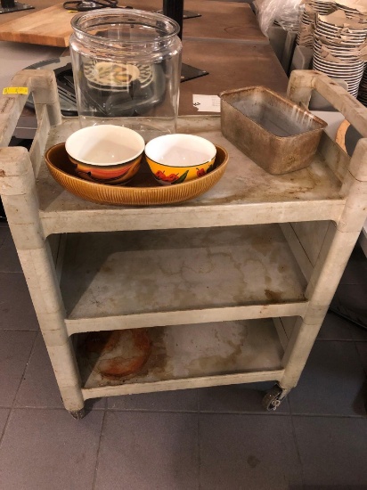 Rubbermaid three shelf kitchen cart with miscellaneous pan and bowls